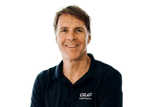 MartinGraf, Mitglied des Aufsichtsrats der bad und heizung concept AG, vor neutralen Hintergrund.