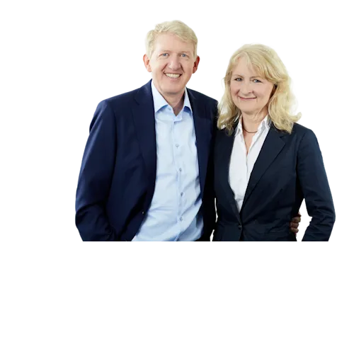 Joachim Kreuz und Ruth Kreuz vor neutralem Hintergrund.