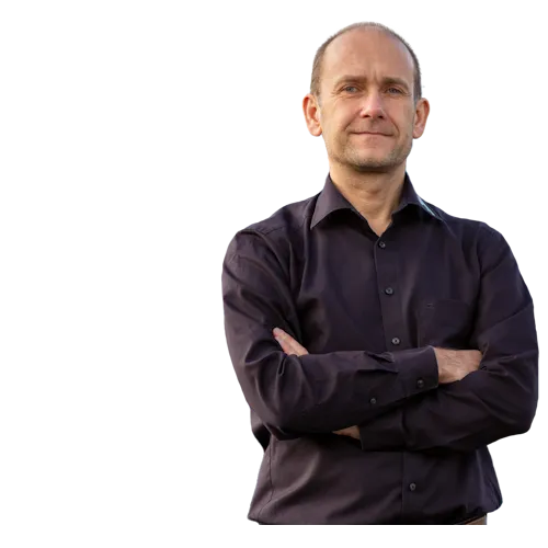 Geschäftsführer Michael Prehn vor neutralem Hintergrund.